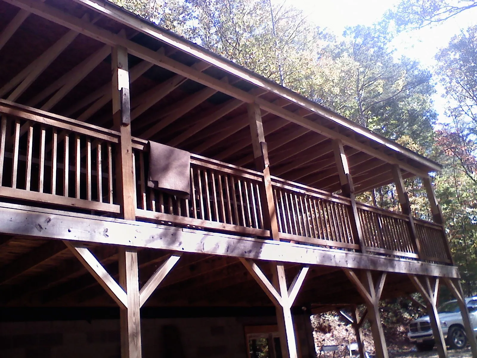 Timber framing under a new elevated porch and deck — Roof Leak Repair in Whigham by Roofing Brothers
